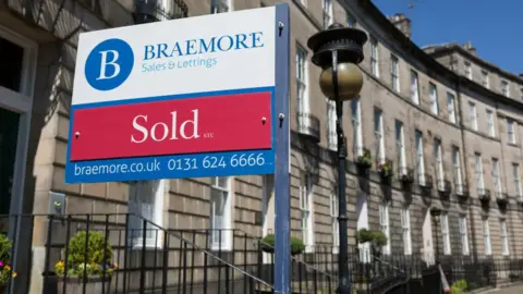 Getty Images house sold sign