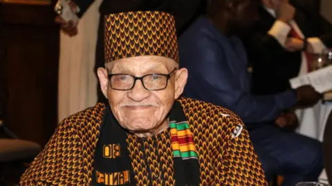 Survivor of 1921 Tulsa race massacre 100 year-old Hughes Van Ellis attends a service at Action Chapel International church in Accra, on August 15, 2021