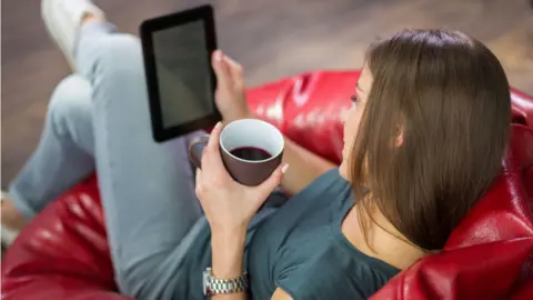 Getty Images Lady reading ebook