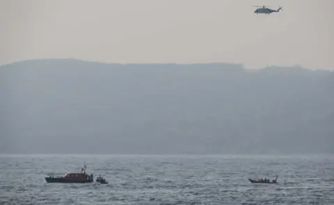 Royal Navy Lifeboats and SAR helicopter