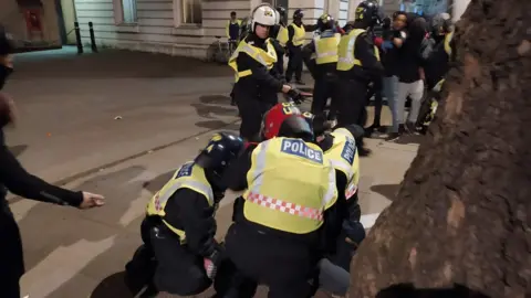 Police clashes with protestors on Downing St