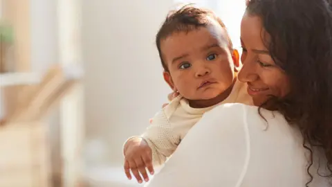 Getty Images A mother and her baby