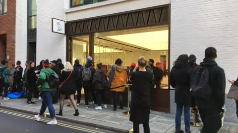 People queuing outside the OVO store