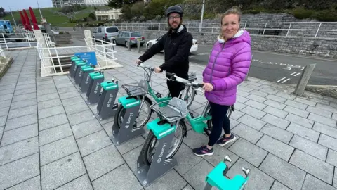 BBC Beryl e-bikes at parking bays on Plymouth Hoe