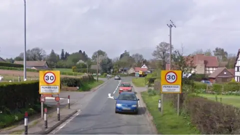 Google Signs on road into Pembridge