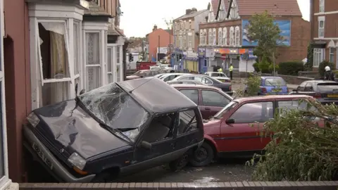 West Midlands Fire Service Cars and houses damaged by the tornado in Birmingham