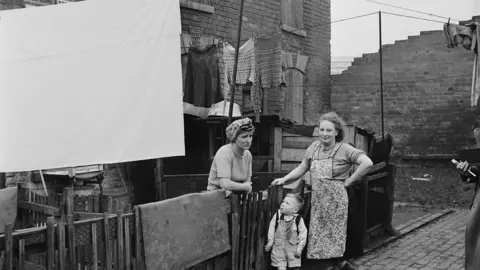 Getty Images Example of the original back to back housing