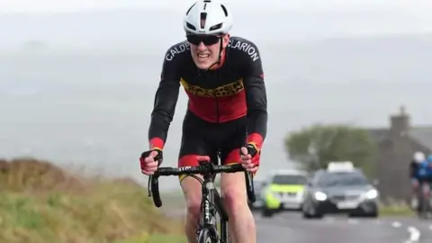 West Yorkshire Police Image of Lewis Smith riding his bike on a road