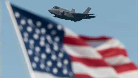 Getty Images F-35 fighter plane pictured with a US flag (file photo)