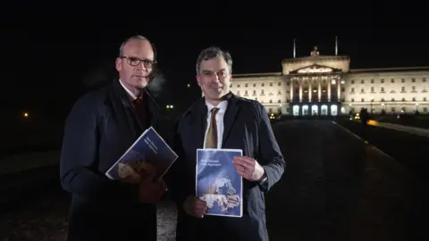 Getty/Charles McQuillan Julian Smith (R) and Irish Tanaiste Simon Coveney