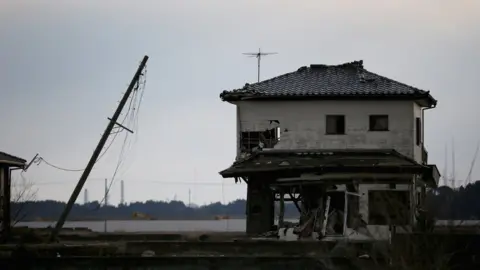 Getty Images A house inside the exclusion zone close to the devastated Fukushima Daiichi Nuclear Power Plant on February 26, 2016 in Namie, Fukushima Japan