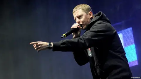 Getty Images Professor Green on stage