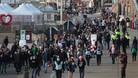 PA Media Anti-lockdown protest in Brighton on 12 December