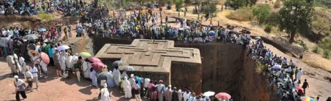 AFP Ethiopian Orthodox Christian gather near to the rock-hewn church Bete Giyorgis during the annual festival of Timkat in Lalibela, Ethiopia which celebrates Epiphany, the Baptism of Jesus in the Jordan River, on 20 January 2012