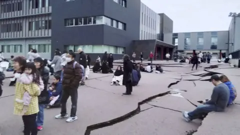 Huge cracks split roads in central Japan following the powerful earthquake on new year's day