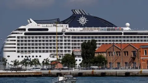 Reuters The MSC Orchestra cruise ship in Venice, Italy. Photo: 3 June 2021