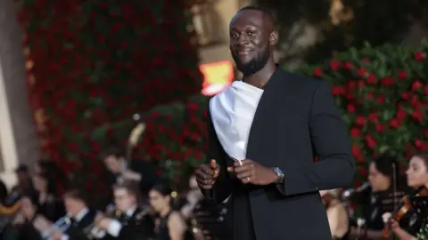 Getty Images Stormzy in Ferragamo on the Vogue World red carpet