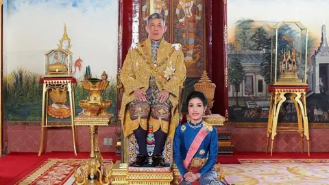 Reuters Thailand's King Maha Vajiralongkorn and General Sineenat Wongvajirapakdi, the royal noble consort pose at the Grand Palace in Bangkok, Thailand