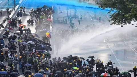 AFP police use water cannon