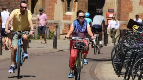 Getty Images Cyclists and pedestrians in Cambridge