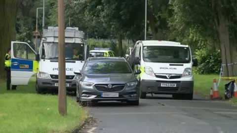 BBC Police vehicles in Dane Park Road, Hull