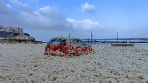 Russell Kennedy Car left covered in foam in Portstewart