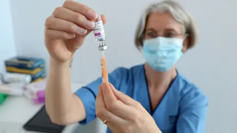 PA Media Covid vaccine