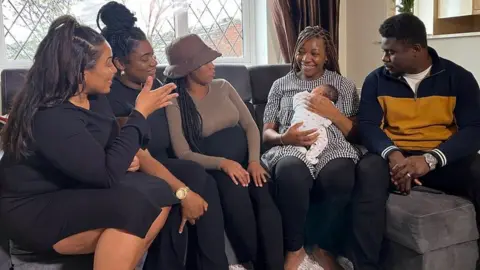 Corinne Wheatley/BBC Natasha Grierson, Melanie Murtagh, Kaphia Dennis, Debby and Chris Minzele