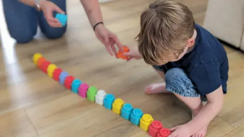 Noah lines up blocks