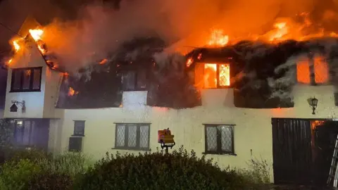 Essex County Fire and Rescue Service Scene of the blaze in June 2019, when a Grade II listed thatched cottage in Cressing Road, Braintree, was devastated by a fire