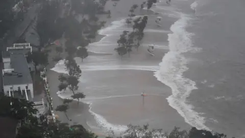 AFP Large waves hit Repulse Bay beach during Super Typhoon Mangkhut in Hong Kong on 16 September 2018.