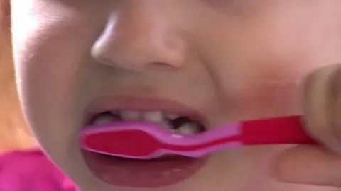BBC Child brushing teeth