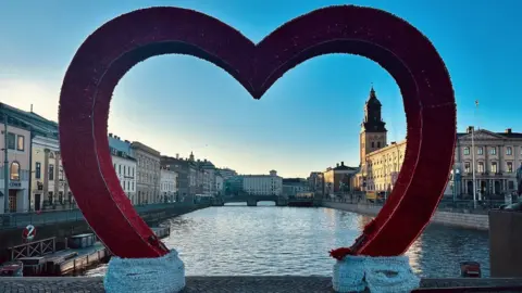 Anthony Saddington/BBC A heart on a bridge over one of Gothenburg's canals