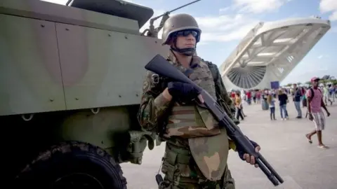 AFP Brazilian marines with armoured personnel carriers (APC) stand guard at the Museum of Tomorrow area in the Portuary Zone of Rio de Janeiro, Brazil, on July 29, 2017.