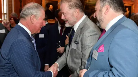 Dominic Lipinski/AFP/Getty Images Prince Charles, Owen Teale and Wynne Evans