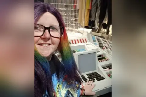 Wendy Clarke Wendy Clarke with rainbow-coloured hair wearing a Dr Who T-shirt