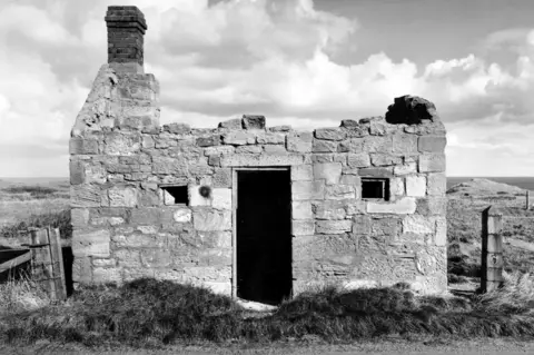 Historic England Archive The pillbox disguised as a cottage