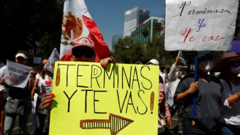 Reuters Anti-government protesters march against Mexican President Andres Manuel Lopez Obrador and the April 10 recall referendum on his presidency, in Mexico City, Mexico April 3, 2022