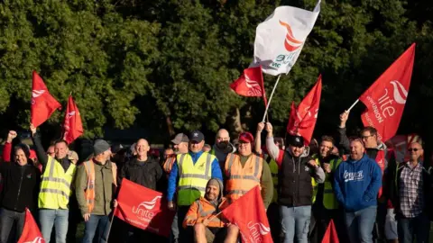 PA Media Unite members stand on picket line at Port of Felixstowe