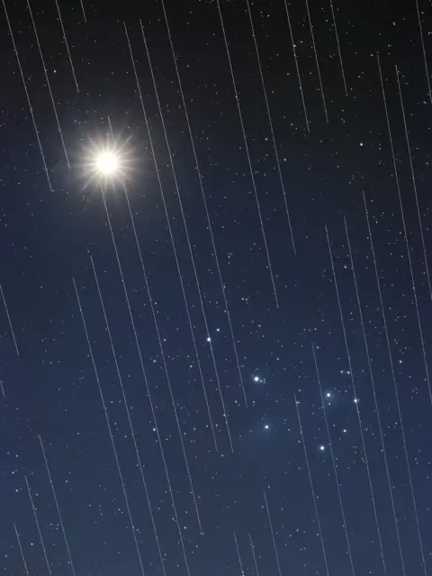 T. Hansen/IAU OAE/CC This image of Venus and the Pleiades shows the tracks of Starlink satellites