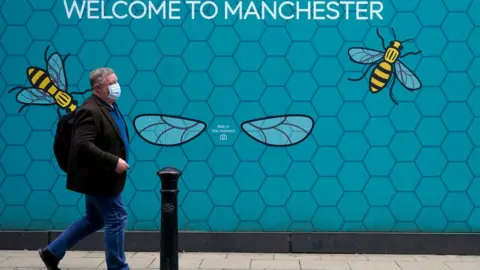 Getty Images Picture of man walking by bees