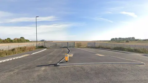 The proposed site near Stallingborough in North East Lincolnshire. It is an open field that has fencing around it