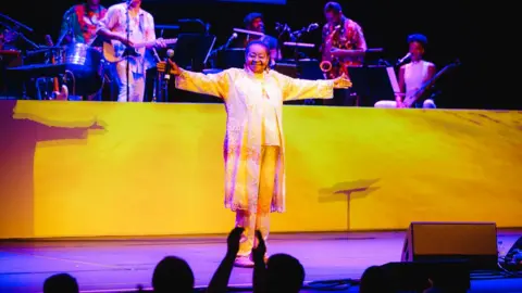 Emile Holba Calypso Rose on stage at the Barbican
