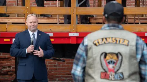 Getty Images Sean O'Brien speaks at a Teamsters Local 25 event in 2021