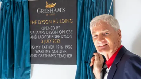 DYSON Sir James Dyson unveiling a plaque