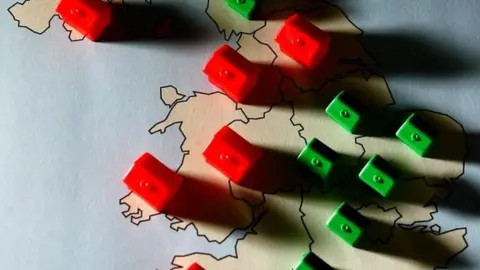 PA Monopoly pieces on map