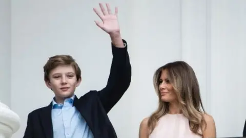 Getty Images Barron Trump and his mother, First Lady Melania Trump.