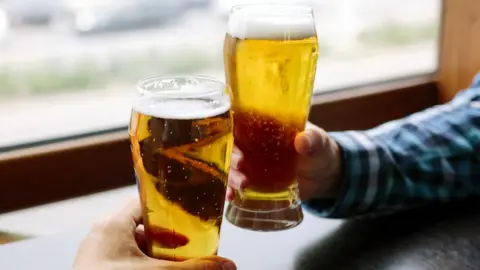 Getty Images Two pints of lager