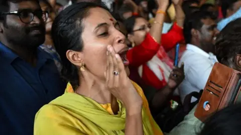 People celebrate India's Moon landing