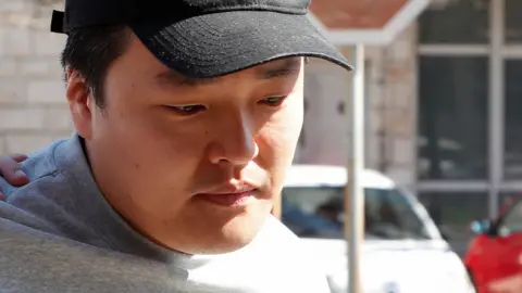 Reuters Do Kwon with a black cap on